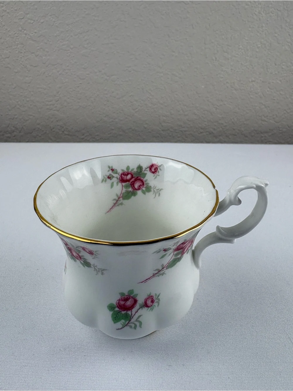 Royal Albert Bone China Teacup and Saucer Featuring the Rose Time Pattern